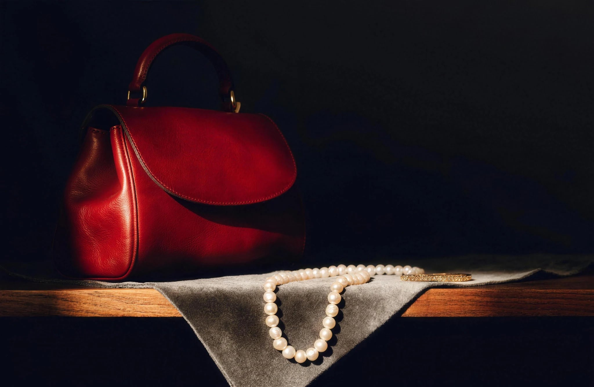 Designer bag and jewellery presented for assessment